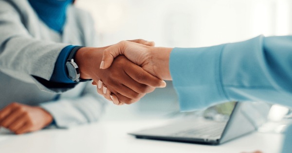 Professional business handshake agreement - PEO professional employer organization